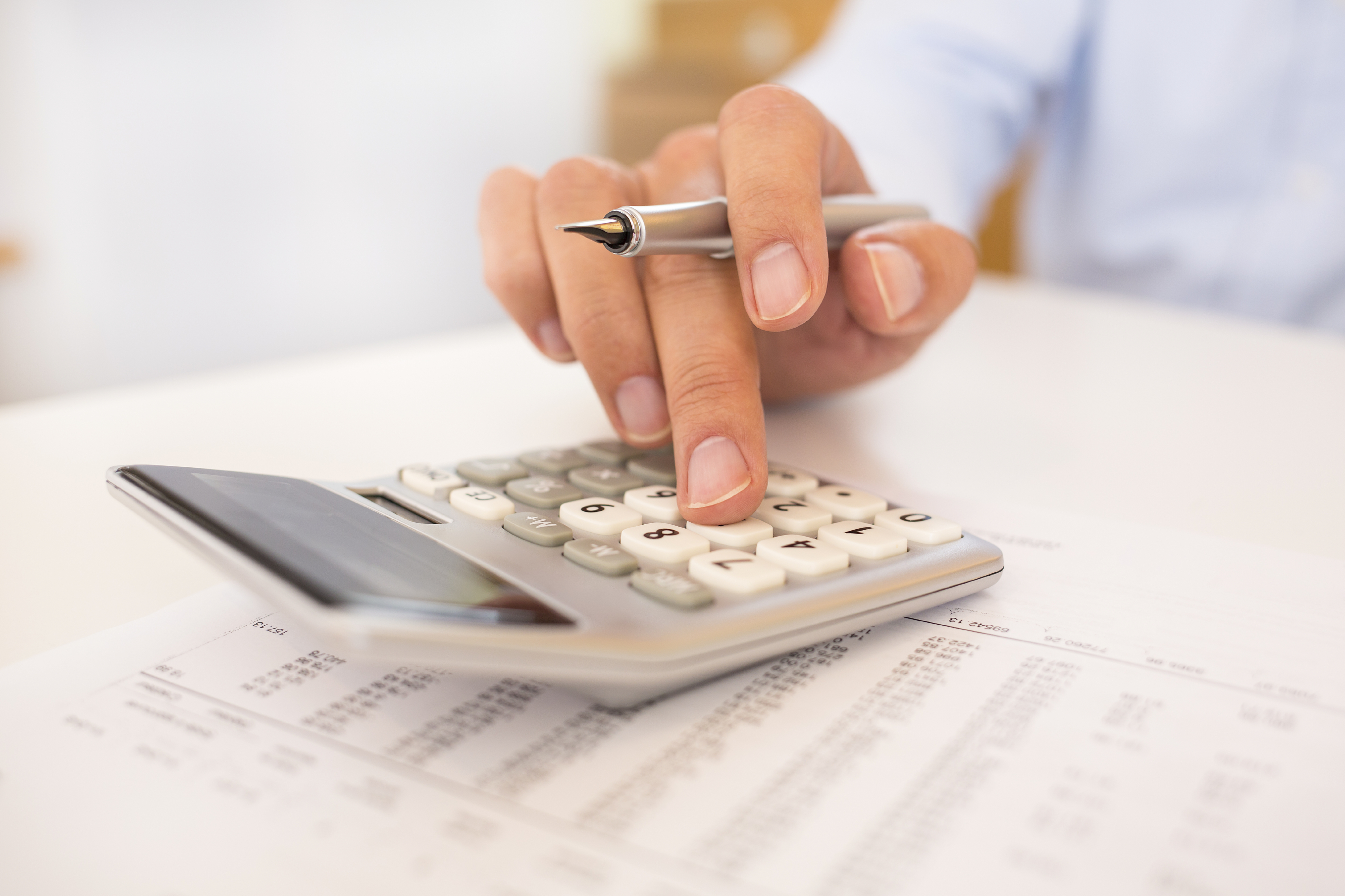 Man doing his accounting, financial adviser working