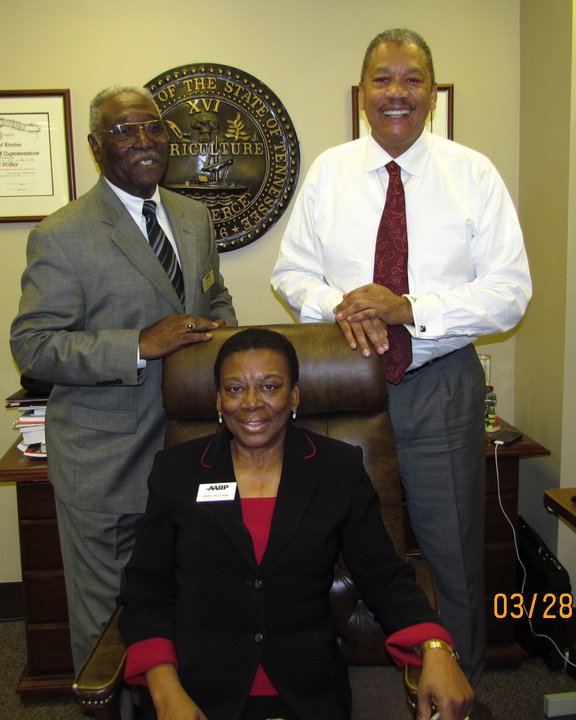 AARP volunteers often visit with their state legislators (and sometimes test their chairs!)