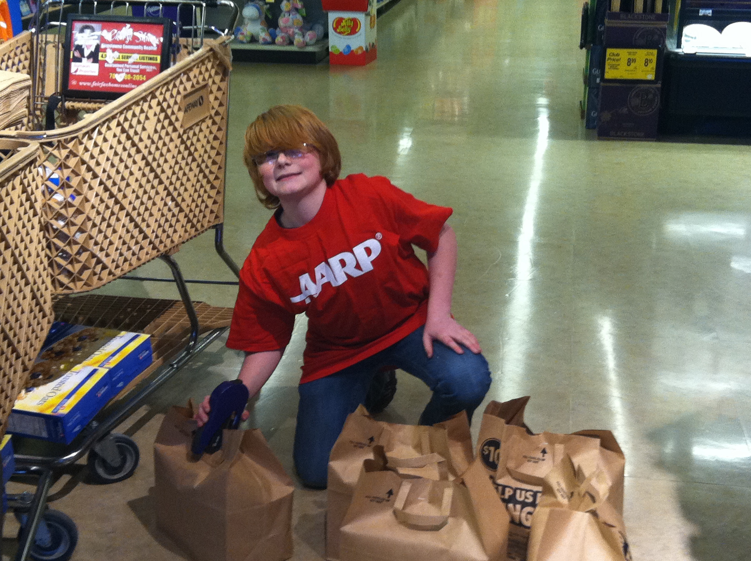 Kelly's 14-year-old neighbor offered to help encourage customers to donate at a local Safeway store in Alexandria, VA.