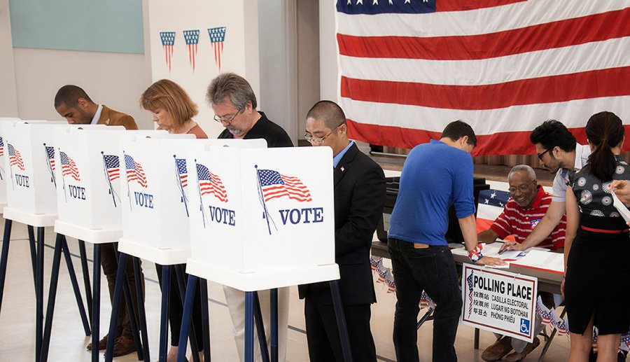 voters-at-polling-station.imgcache.rev.web.900.517.jpg