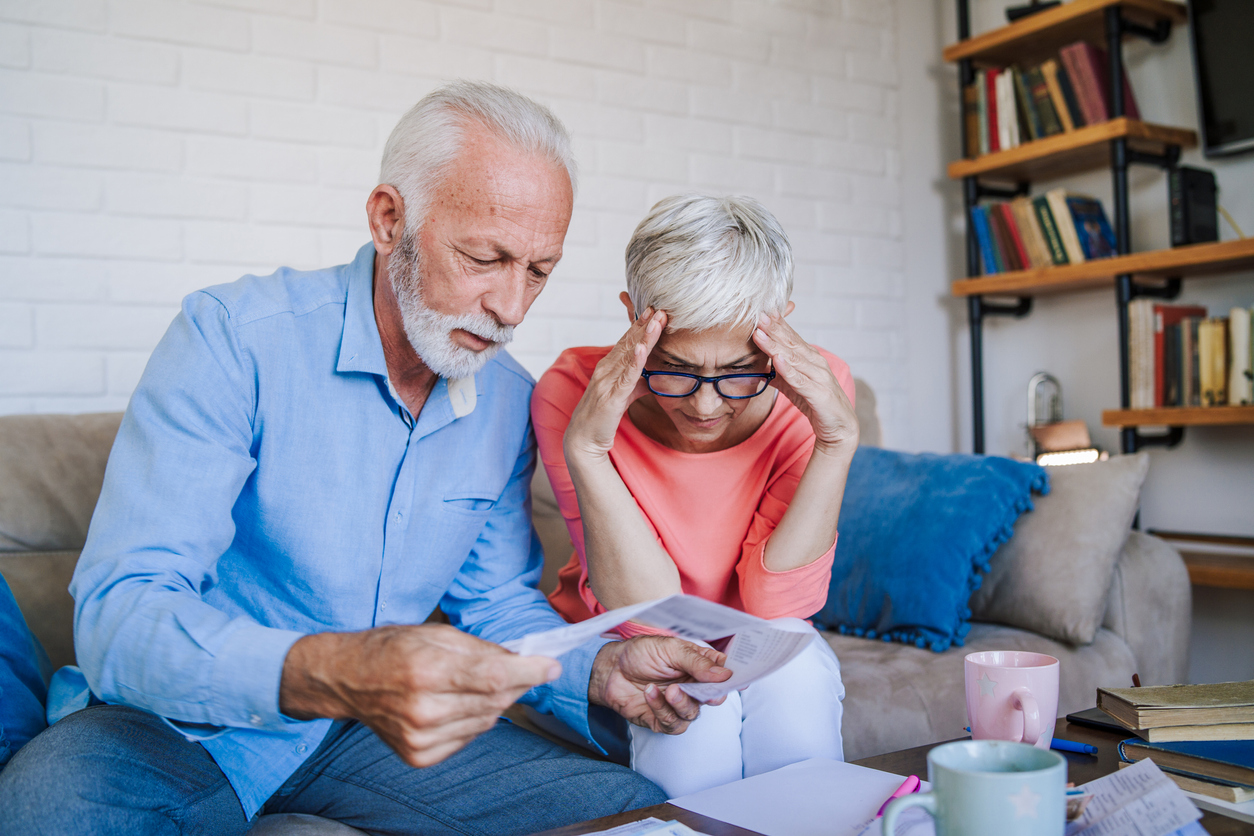 Senior couple having problems with home finances