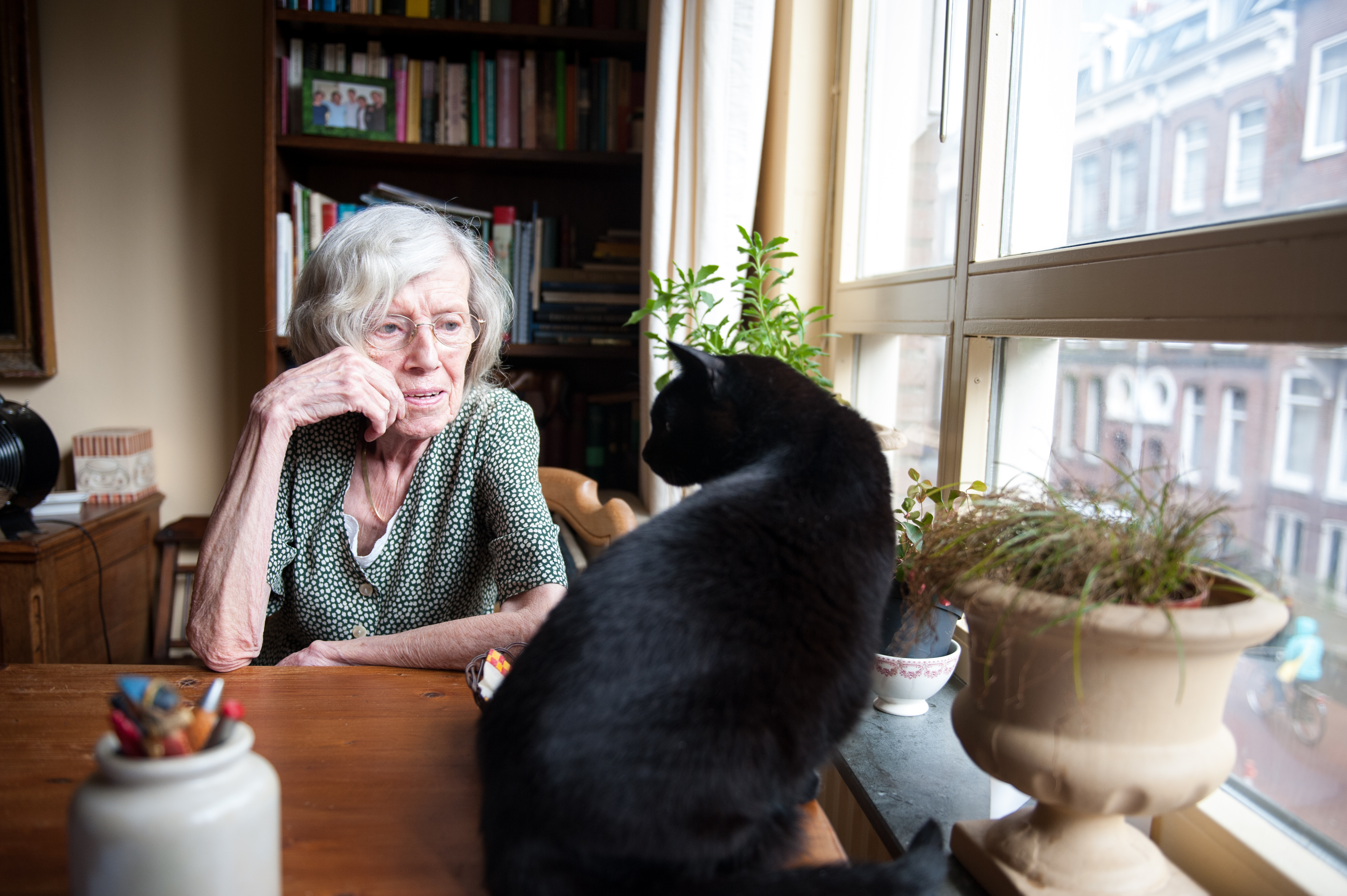 Senior woman with her cat