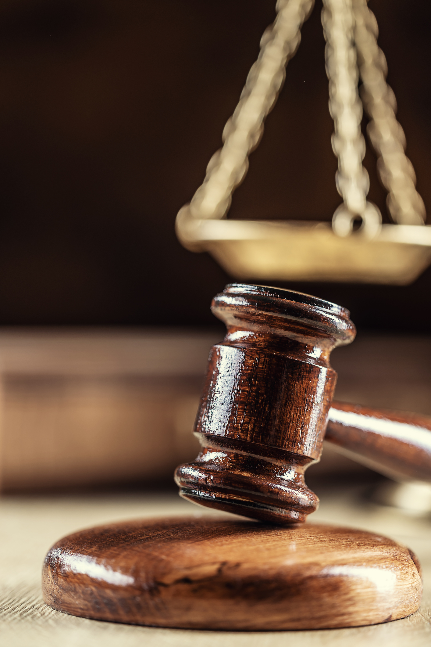 The judge's gavel and scales as a symbol of the judiciary and justice.