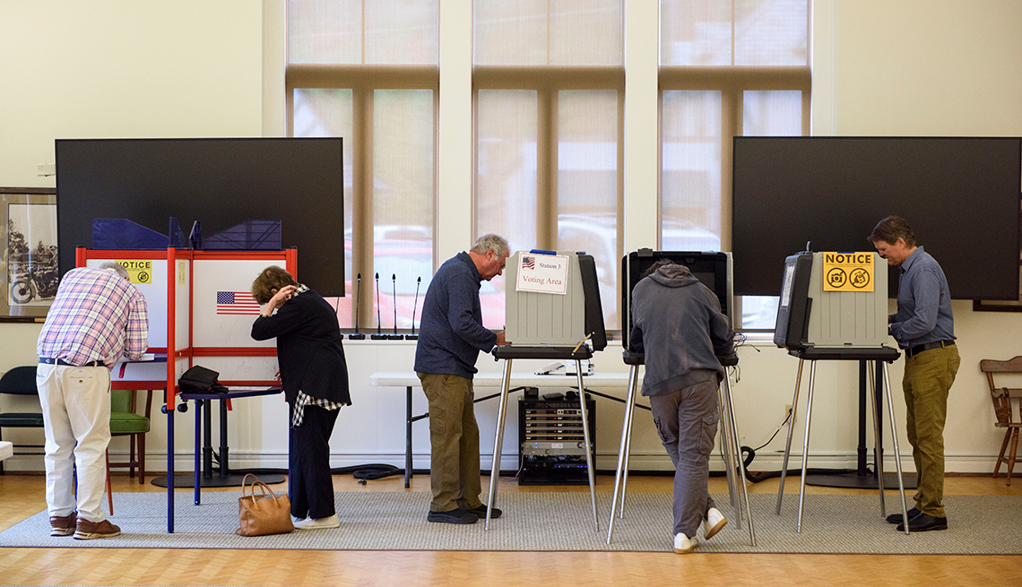 Voters are at voting booths at Biltmore Forest Town Hall in North Carolina during the 2024 election.