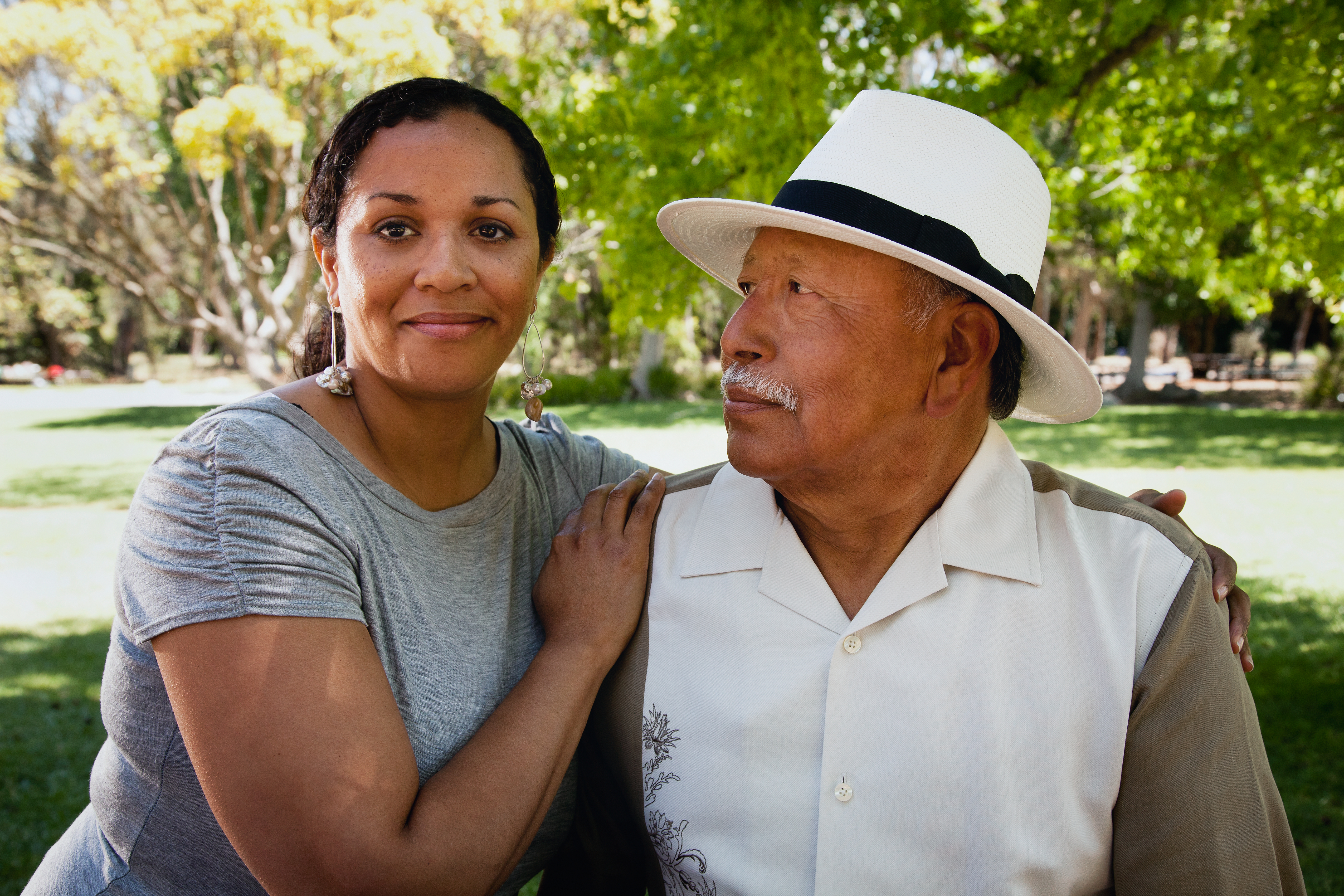 Young woman and her proud father, portrait