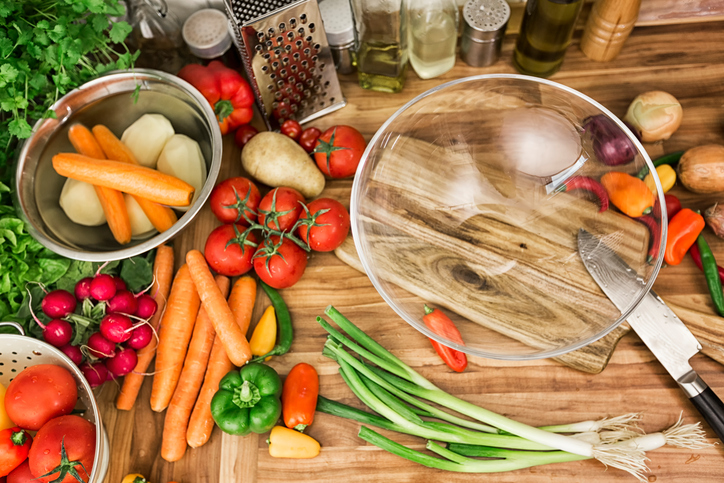 Empty Glass Bowl Surrounded by Vegetables