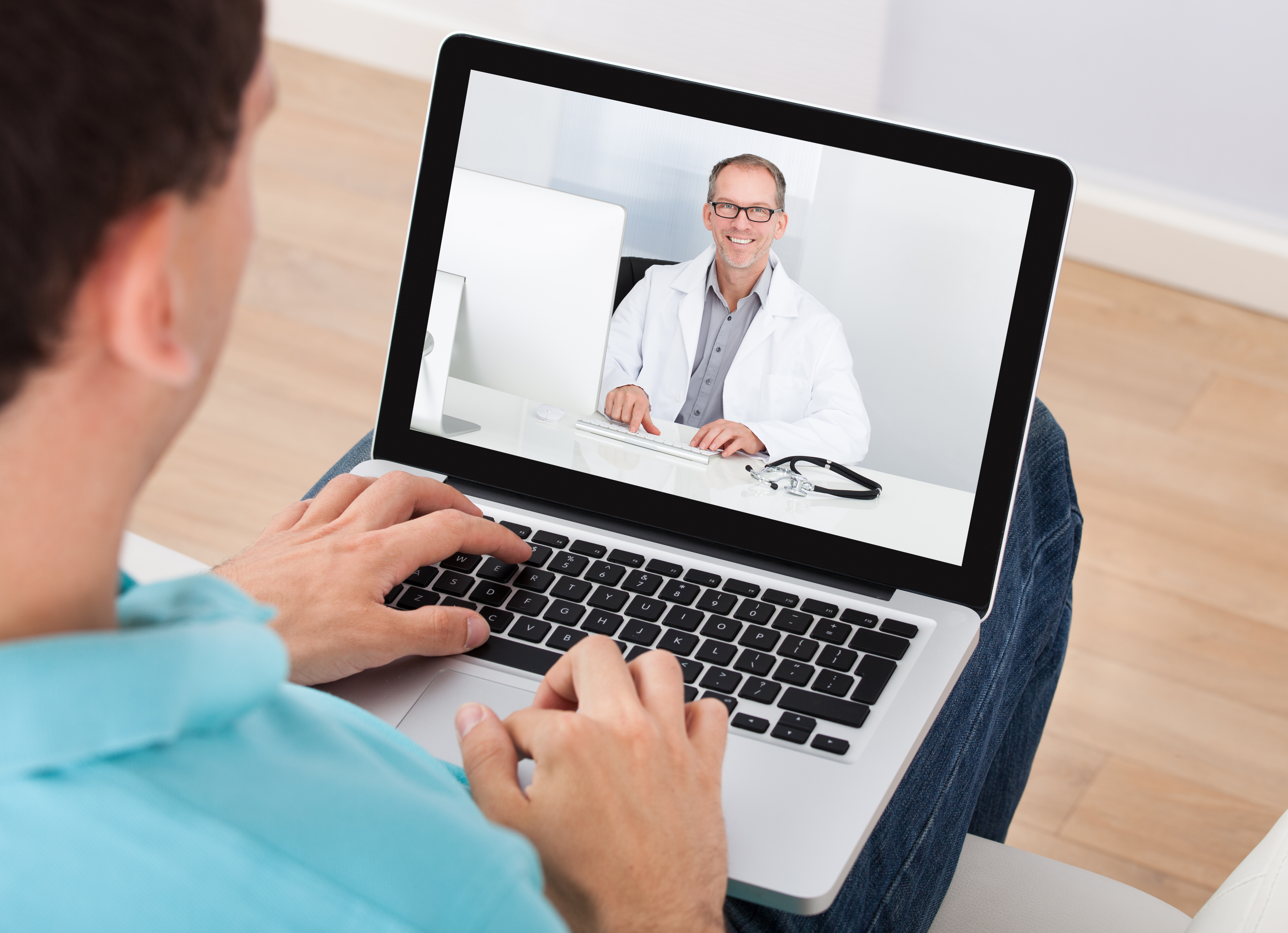 Man Having Video Chat With Doctor