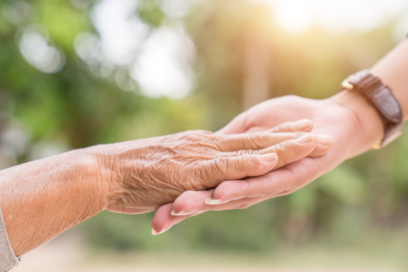 Helping hands, care for the elderly concept