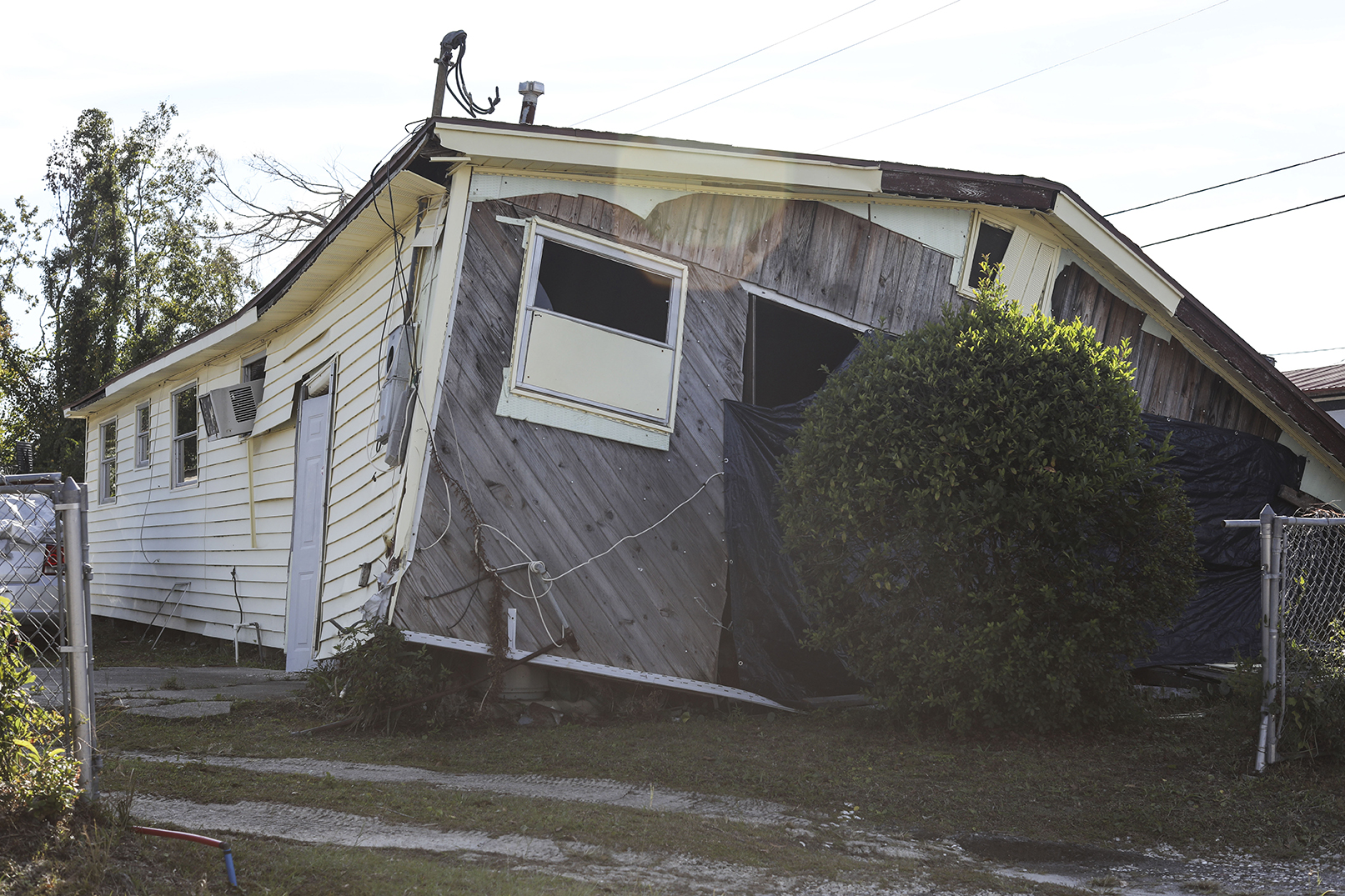 A house severely damaged by a hurricane