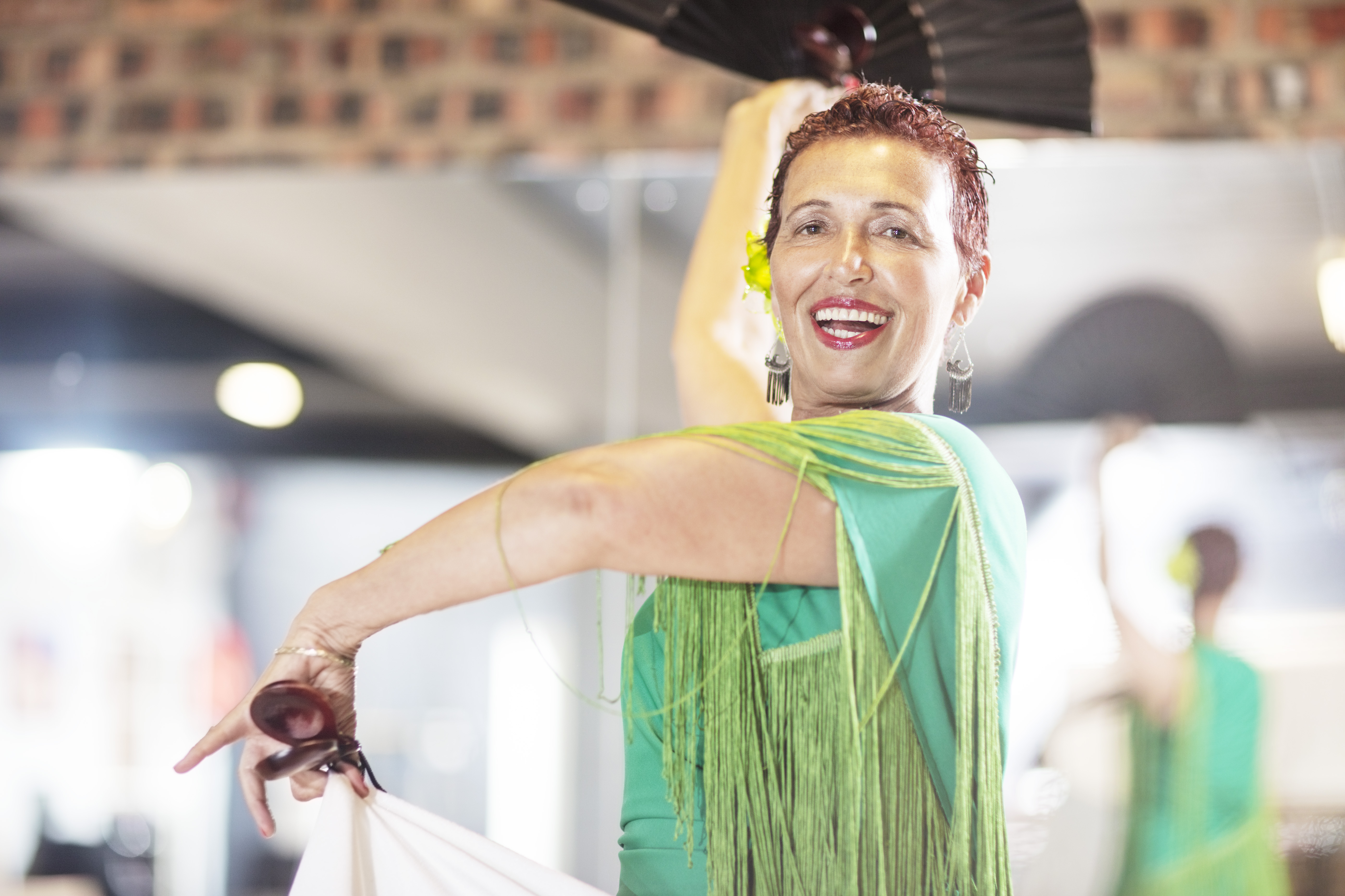 Smiling female senior latin dancer