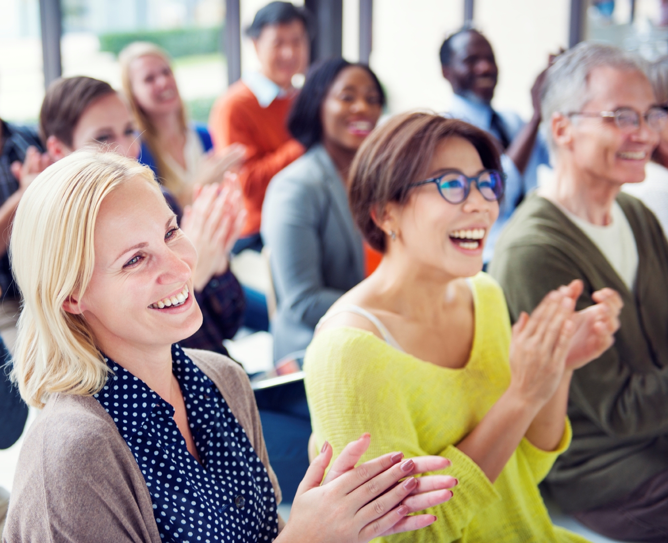 Group of Multiethnic Cheerful People Applauding