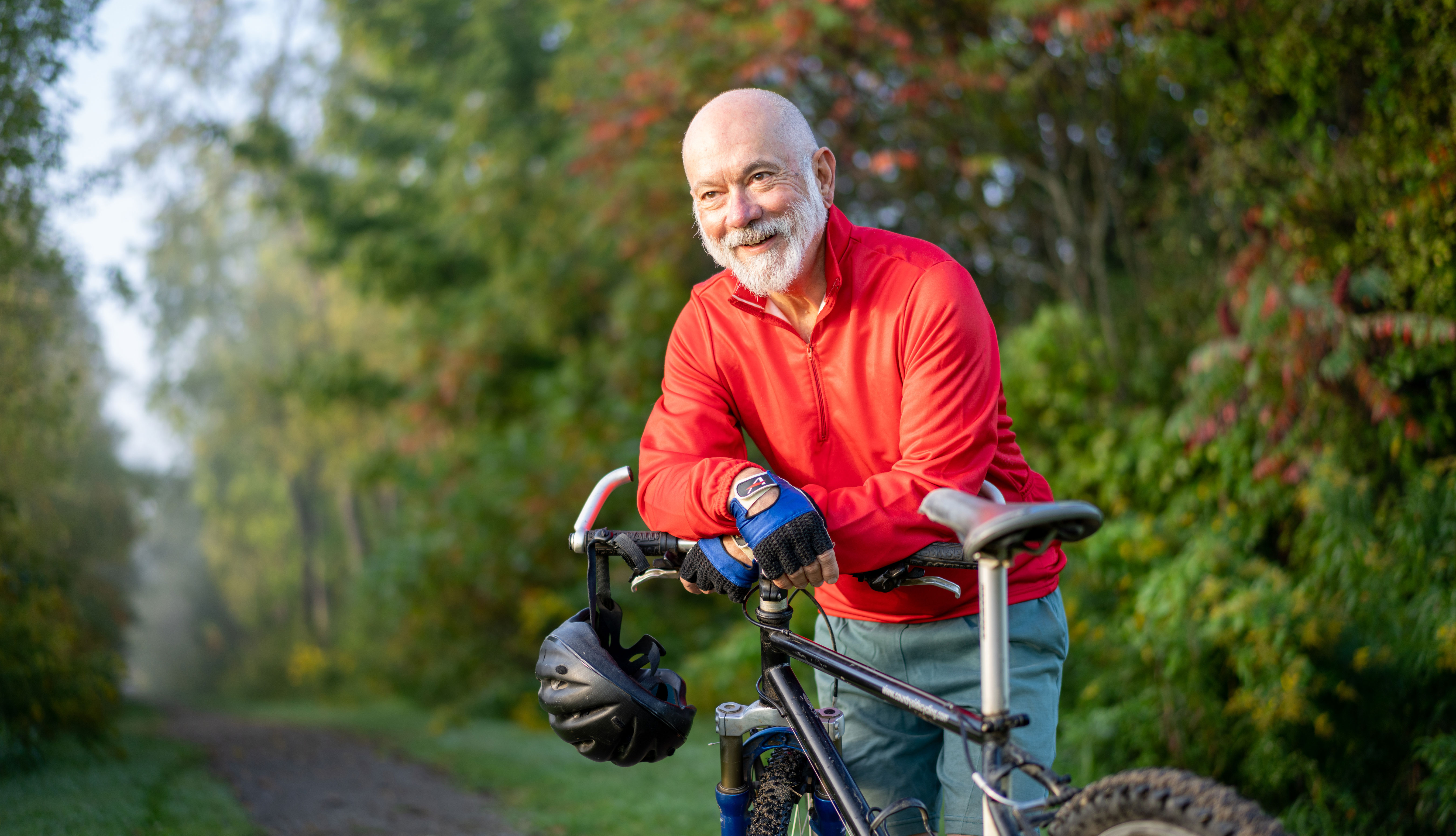 An older man on a bike