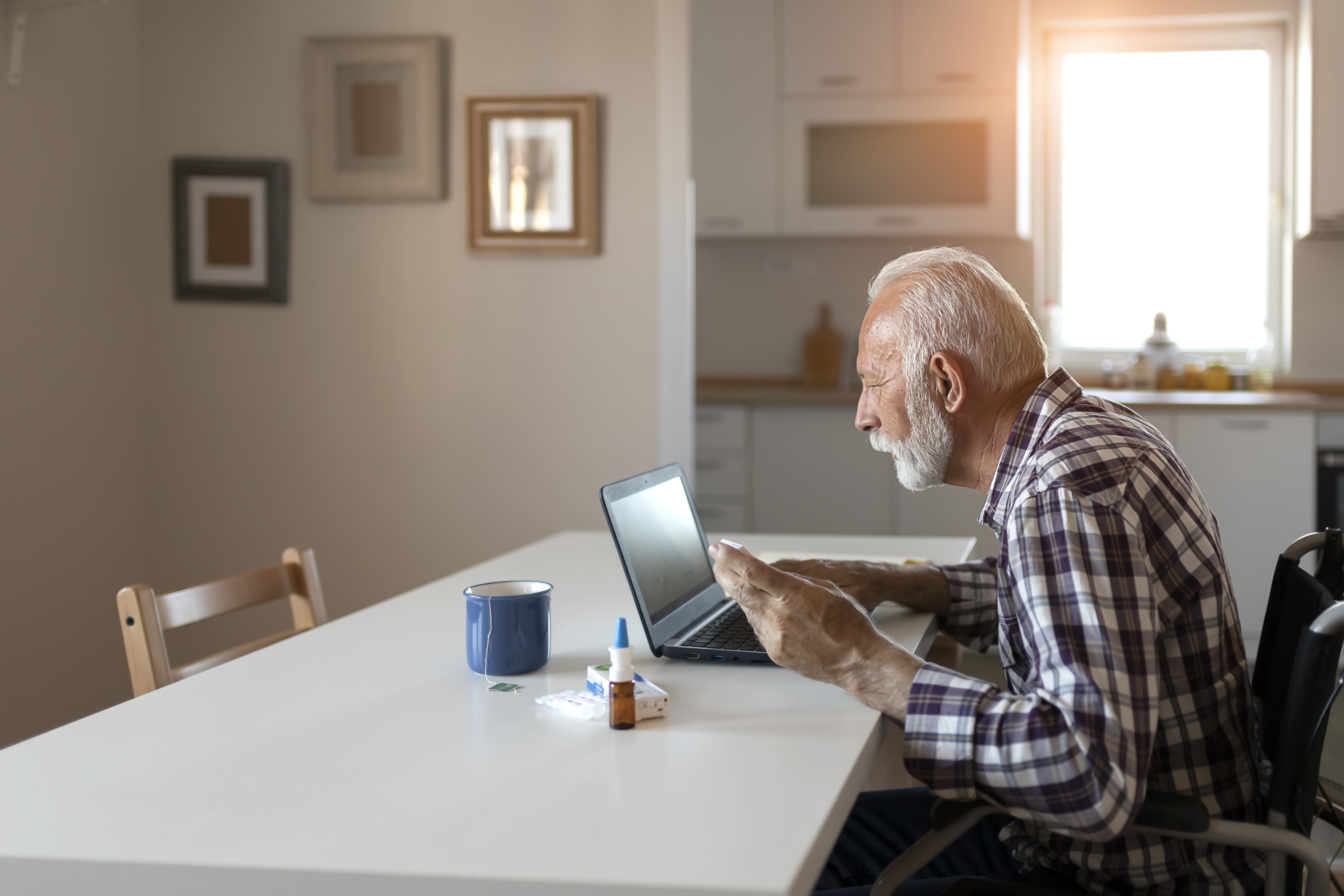 Senior Man Searching Online About Medicine