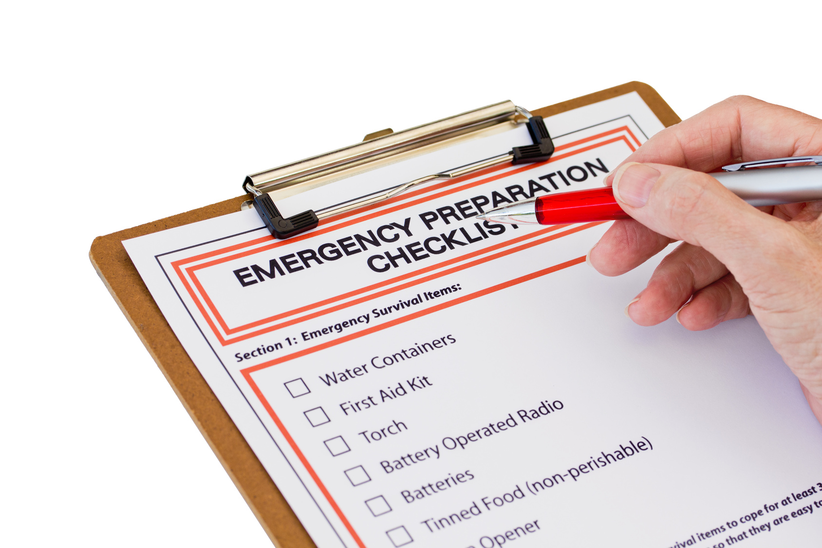 Hand completing Emergency Preparation List