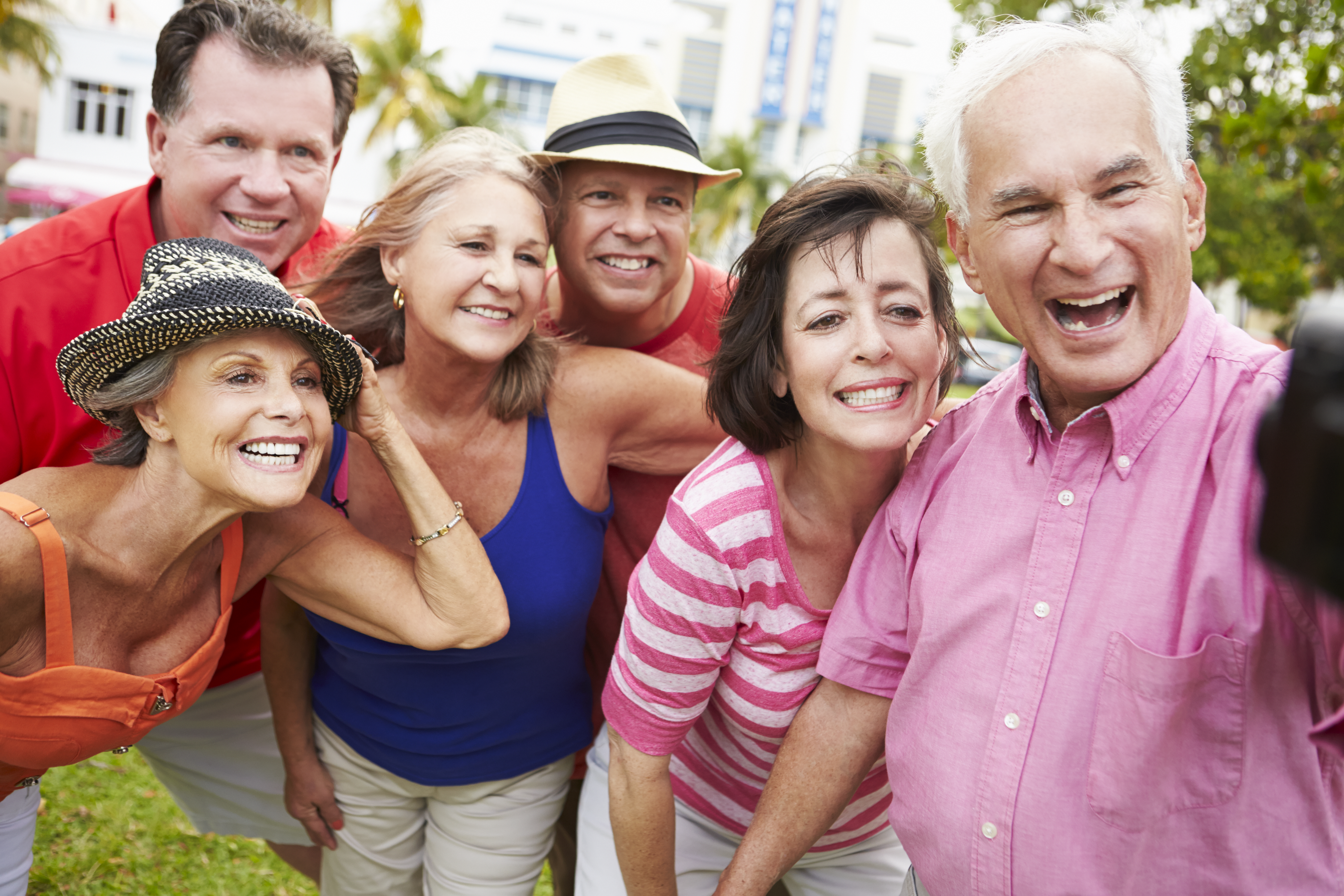 Group Of Senior Friends Taking Selfie In Park
