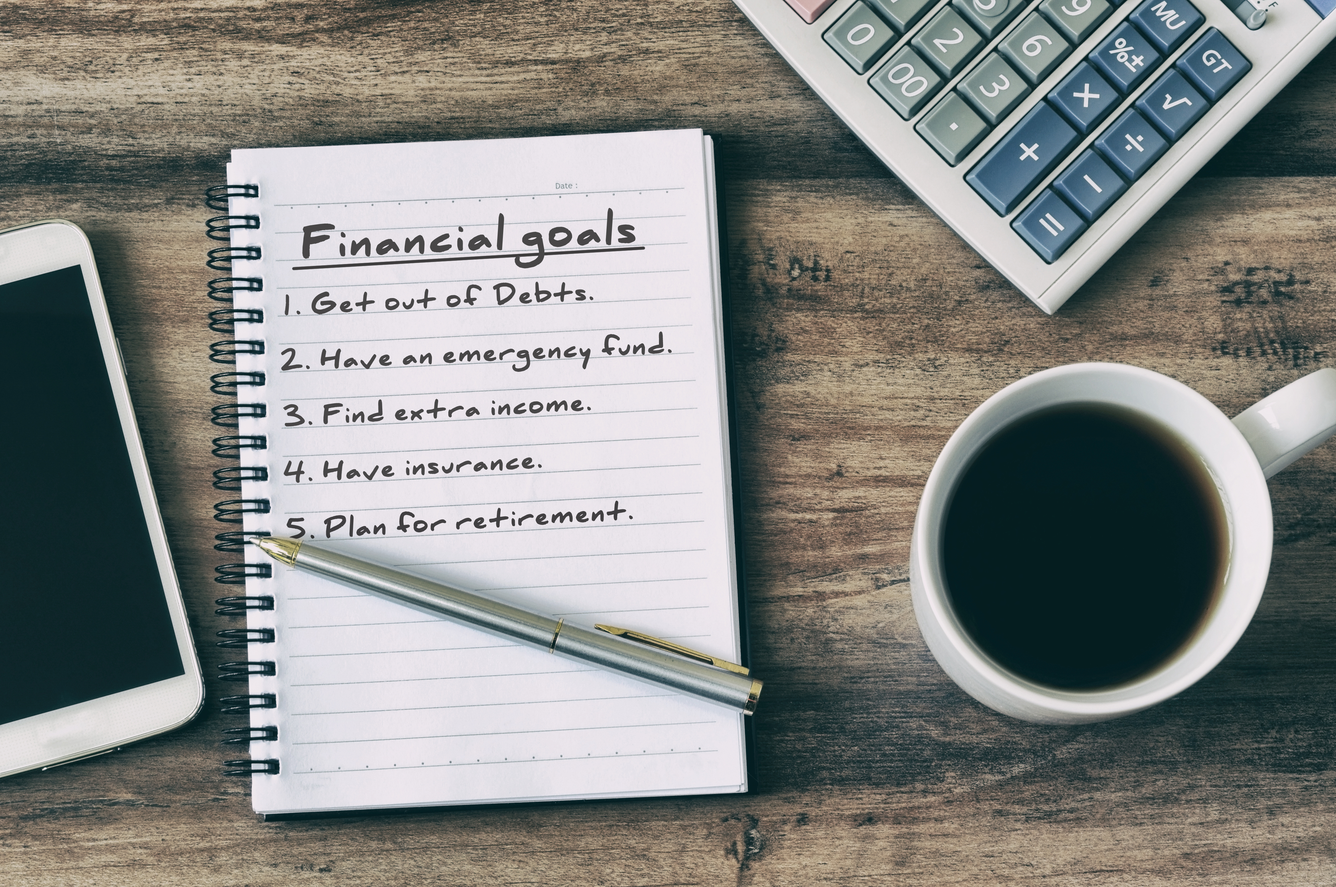 Financial Goal Typed on Note Pad