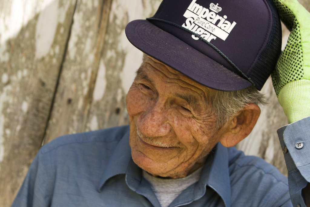 Older worker takes a break from the Texas heat.  