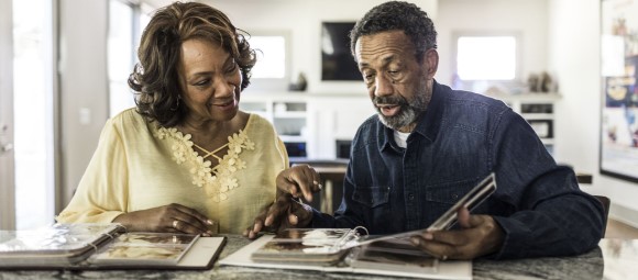 couple looking at photo albums - Convio.jpg