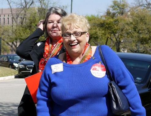 Marie Graziano, AARP Texas volunteer, smiles after a morning of visits with elected offcials in Austin