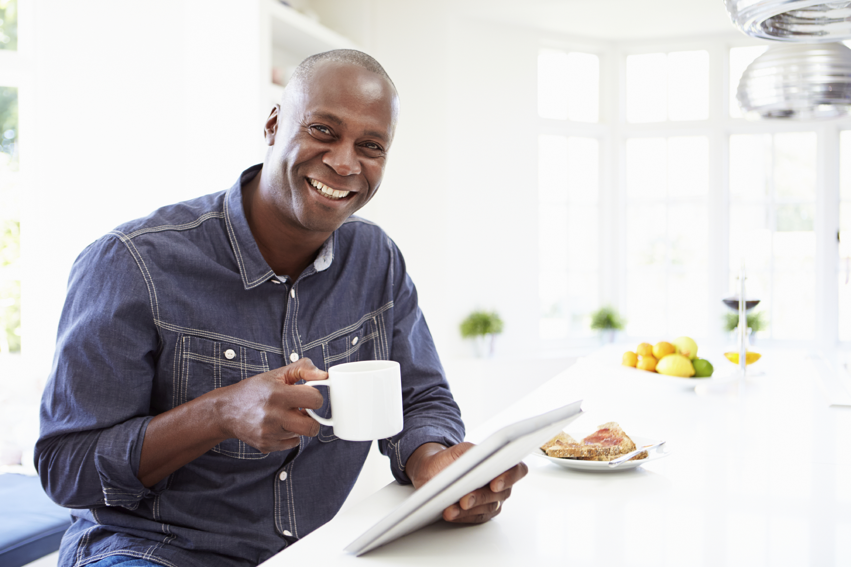 Man reading on tablet