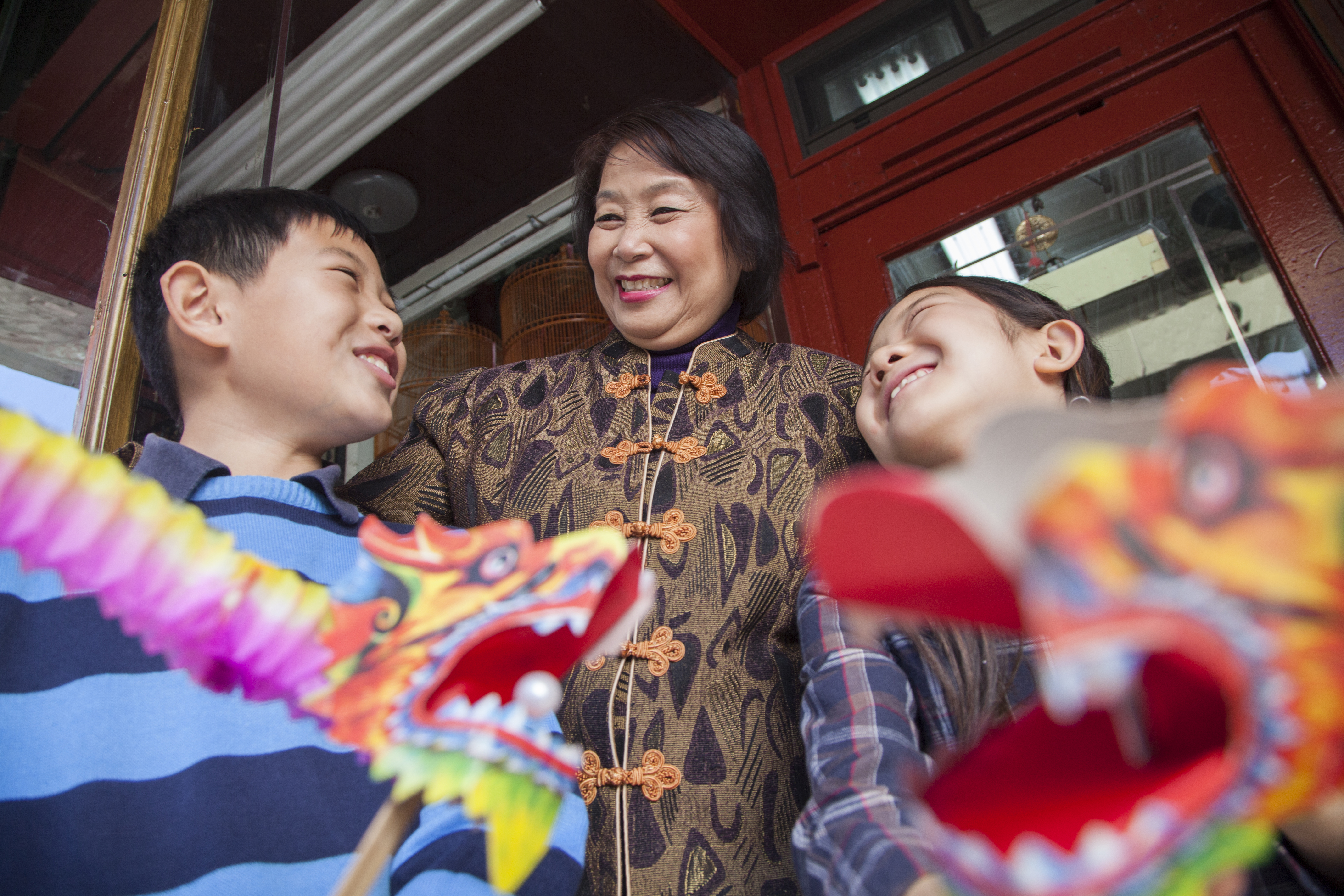 Asian family in front of store