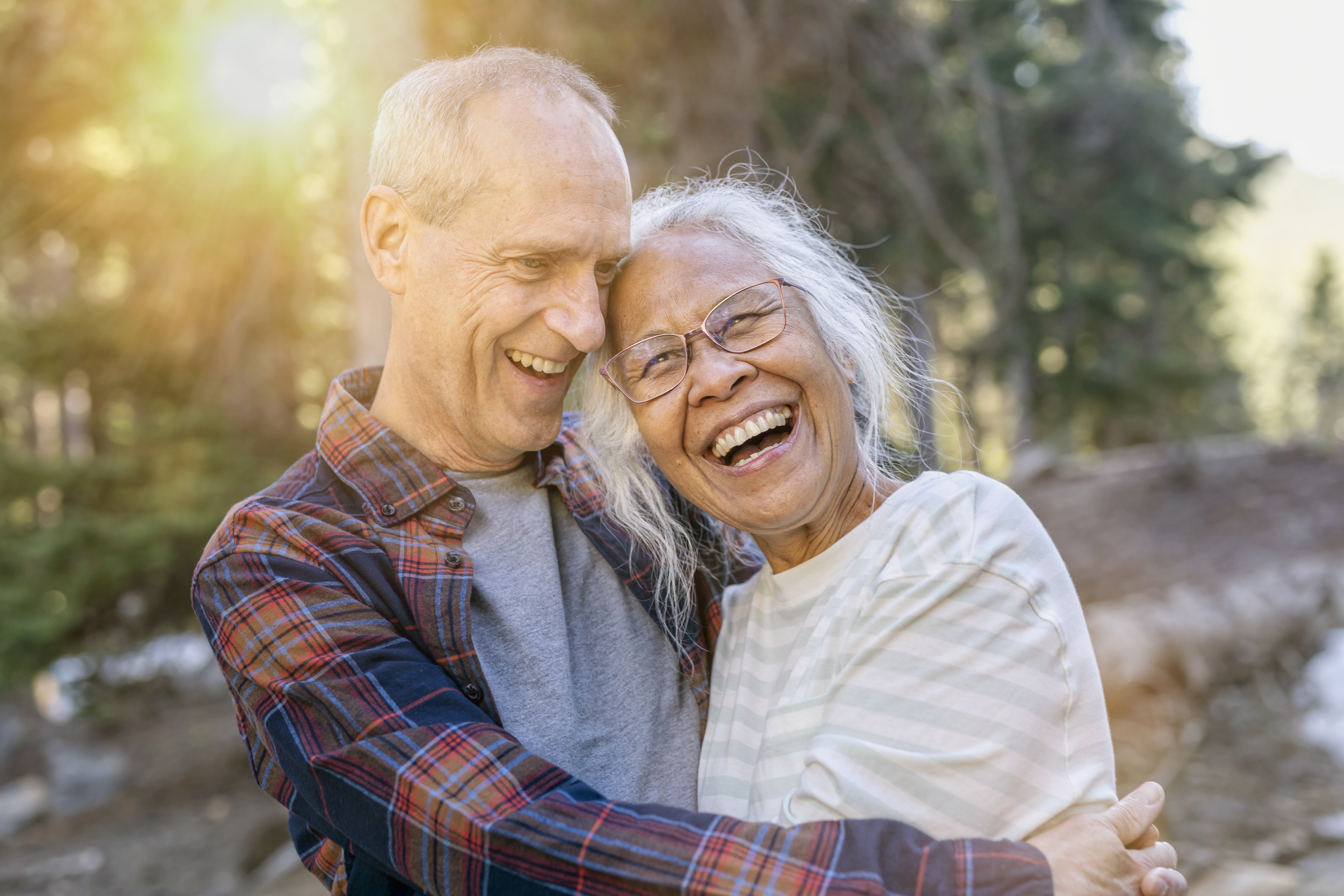 Happy senior couple on vacation hiking