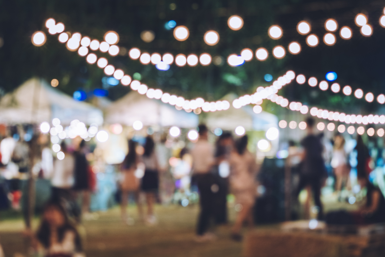 Festival Event Party with Hipster People Blurred Background