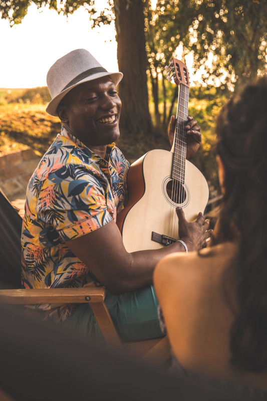 Having an joyful moment in nature with a company of a guitar