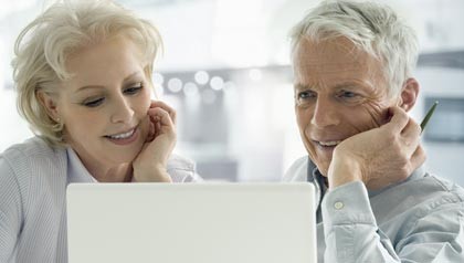 420-mature-couple-staring-at-laptop.imgcache.rev1347299474028.web