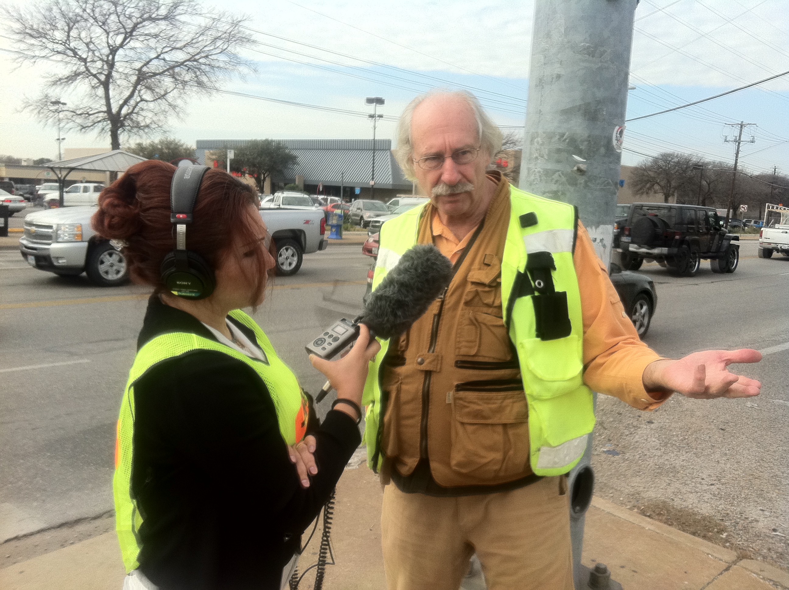 Walkability expert Dan Burden talks to KUT reporter Joy Diaz