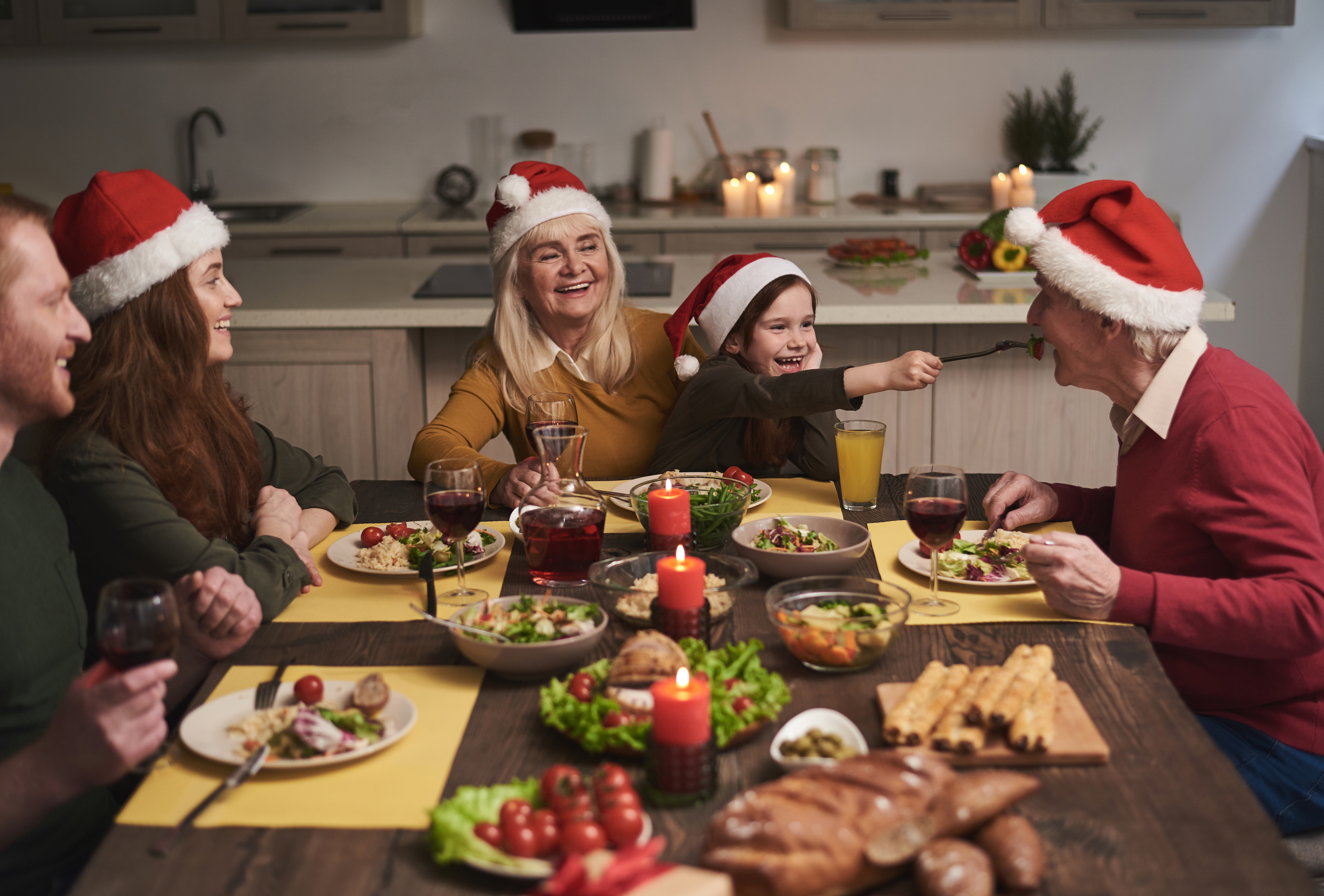 Joyful family having fun during festive dinner