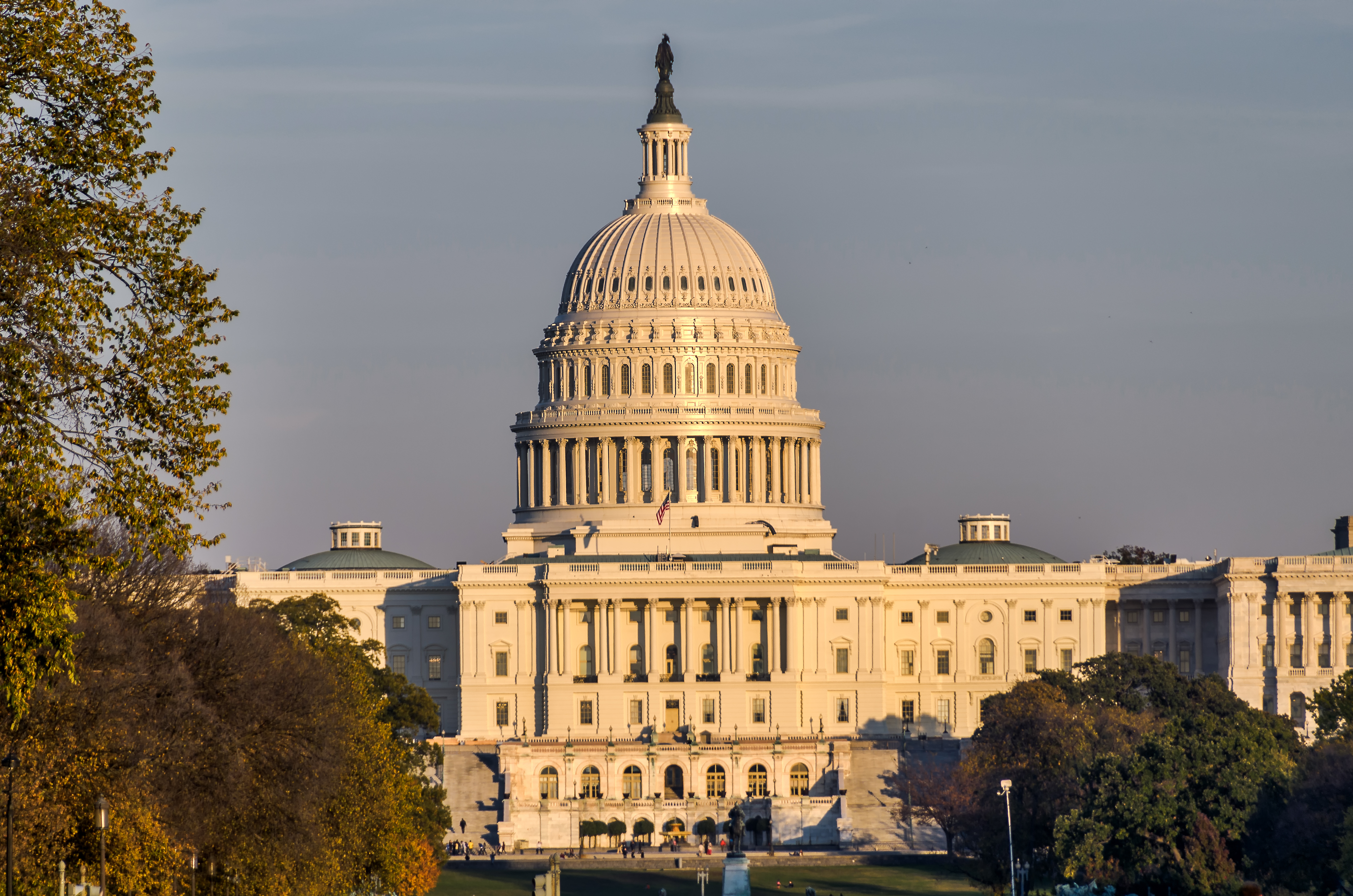 US Capitol, house of Congress, with sunset light