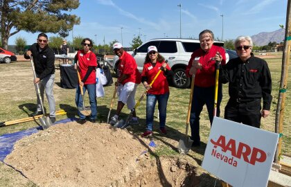 Volunteers plant a tree in North Las Vegas