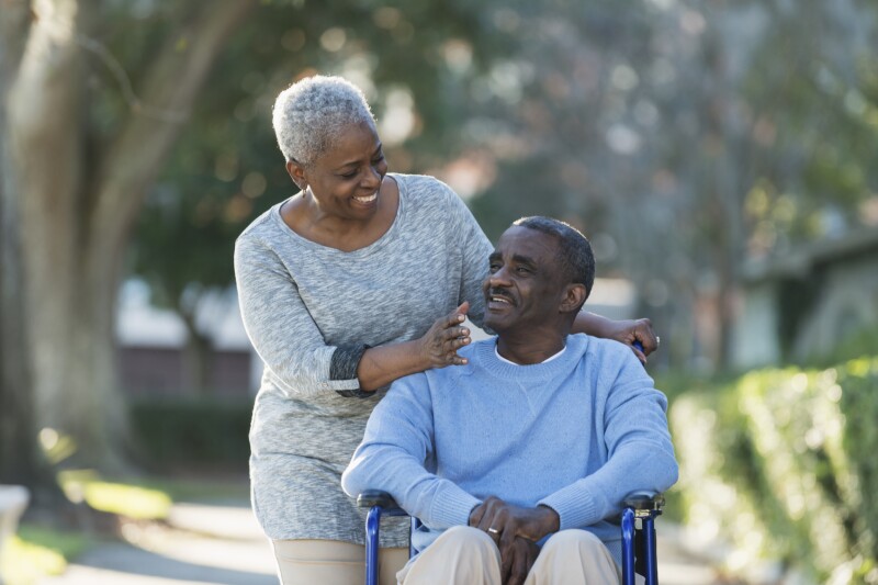 Senior couple with man in wheelchair