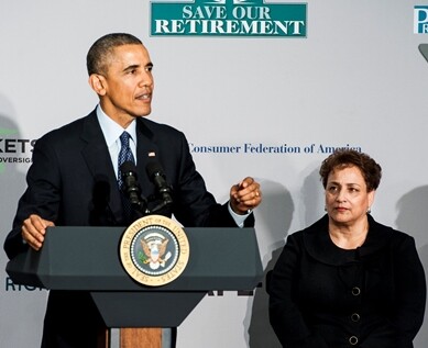 AARP President Jo Ann Jenkins look on as President Barack Obama gives a speech on new rules requiring financial advisers to always act in the best interest of their clients at AARP headquarters in Washington, D.C. on February 23, 2015.
