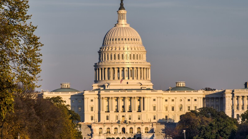 US Capitol, house of Congress, with sunset light