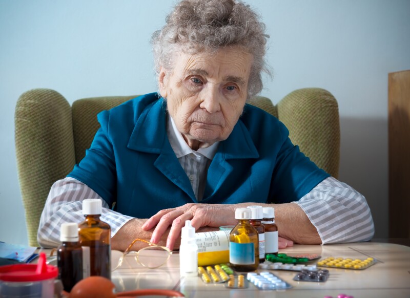 senior woman and medicine