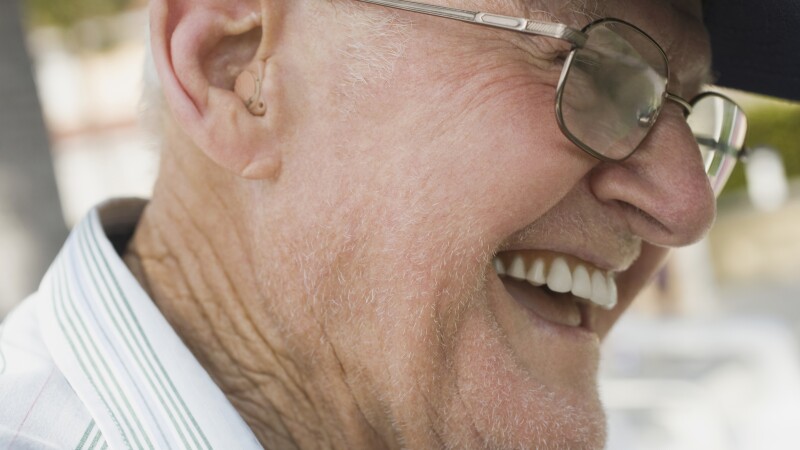 Senior man wearing a hearing aid
