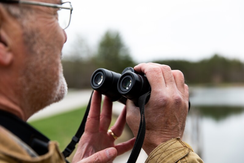 Dennis with binoculars
