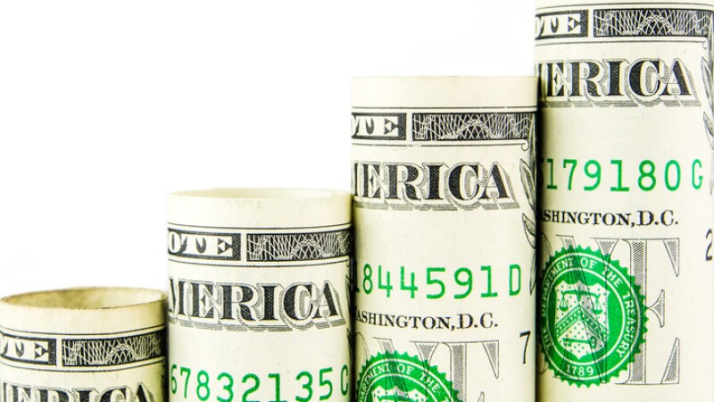 rising steps made of one american dollar banknotes