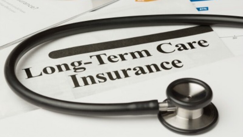 Long-term care insurance information, form and stethoscope.