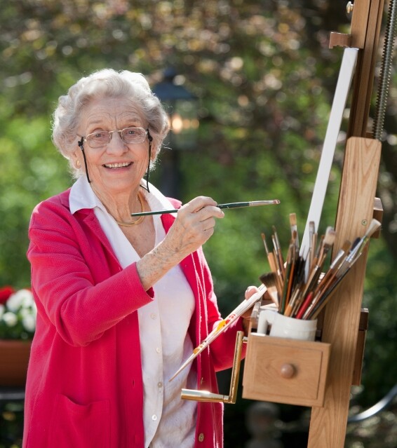 Smiling Senior Woman Painting