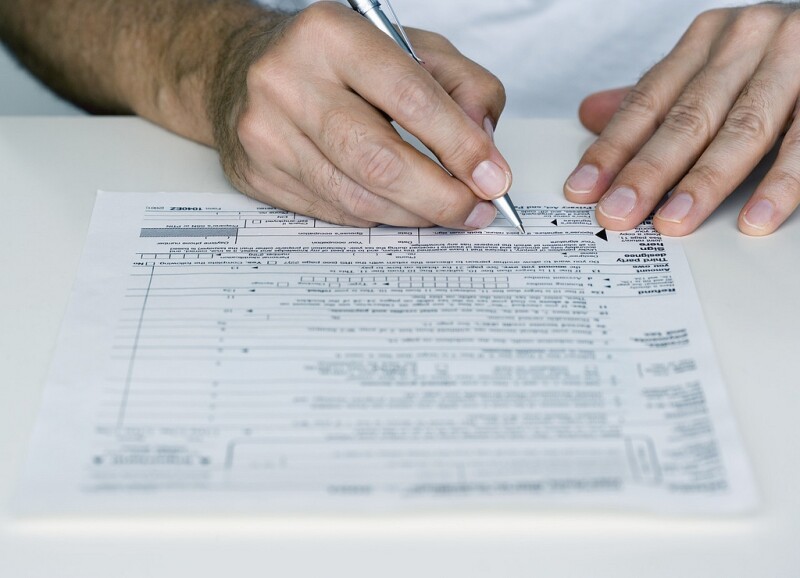 Man Filling out Form