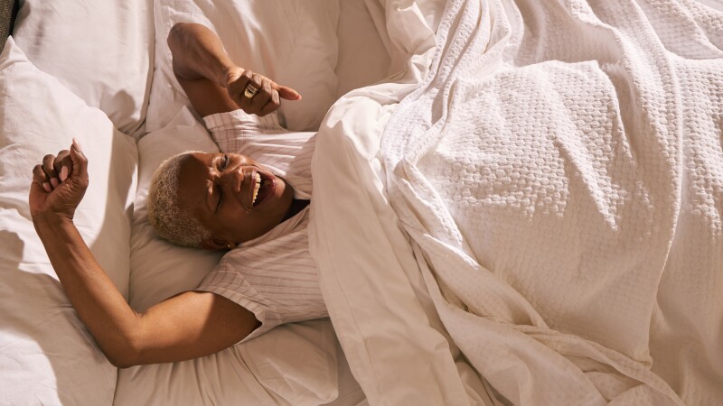 Mature woman in bed (morning)