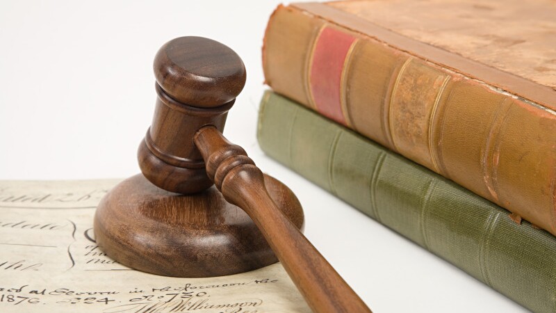 A property document books and a gavel