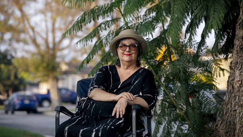 A woman sitting outside