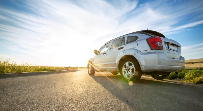 car on road over sunny day