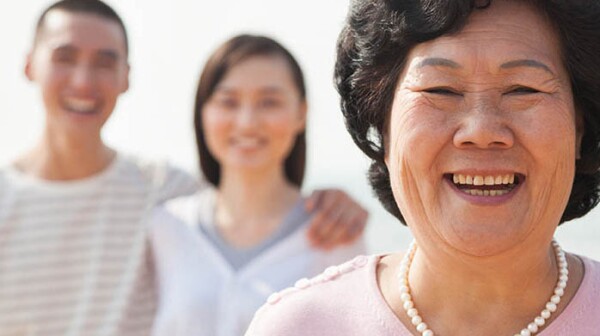 Portrait of Grandmother with Young Couple