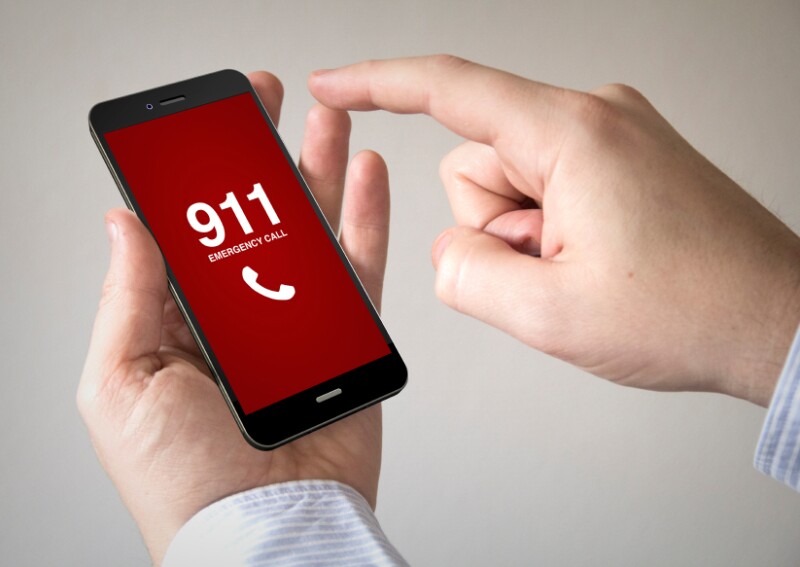 touchscreen smartphone with emergency call on the screen