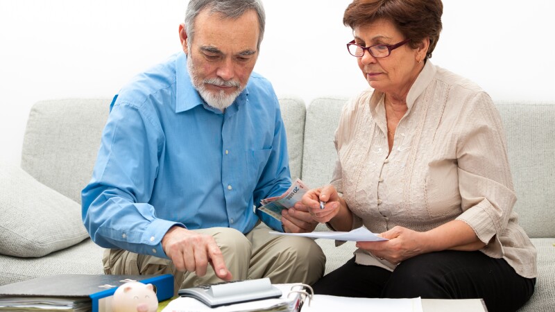 couple calculating home finances
